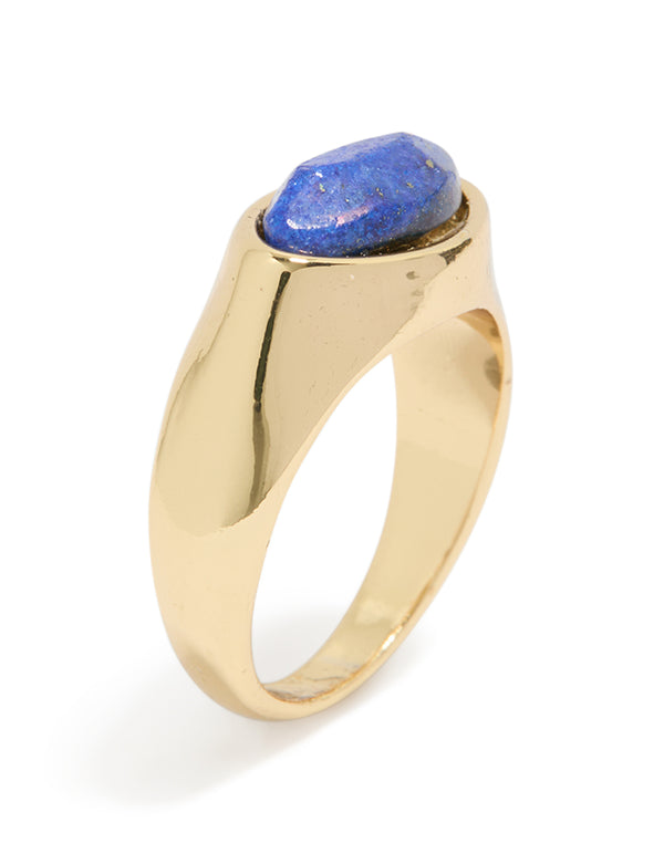 Showcasing a gold plated chunky ring featuring blue and white moody stone front view