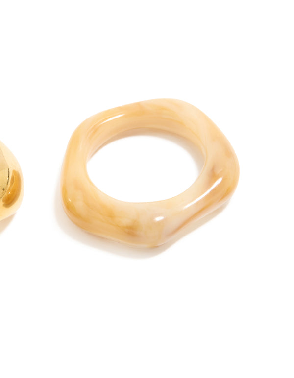 Designed with waterproof gold plated stainless steel and acrylic stacking rings 3-pack close up view