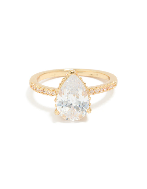 Beautiful statement ring in gold plated crystal with solitaire pear cubic zirconia front view