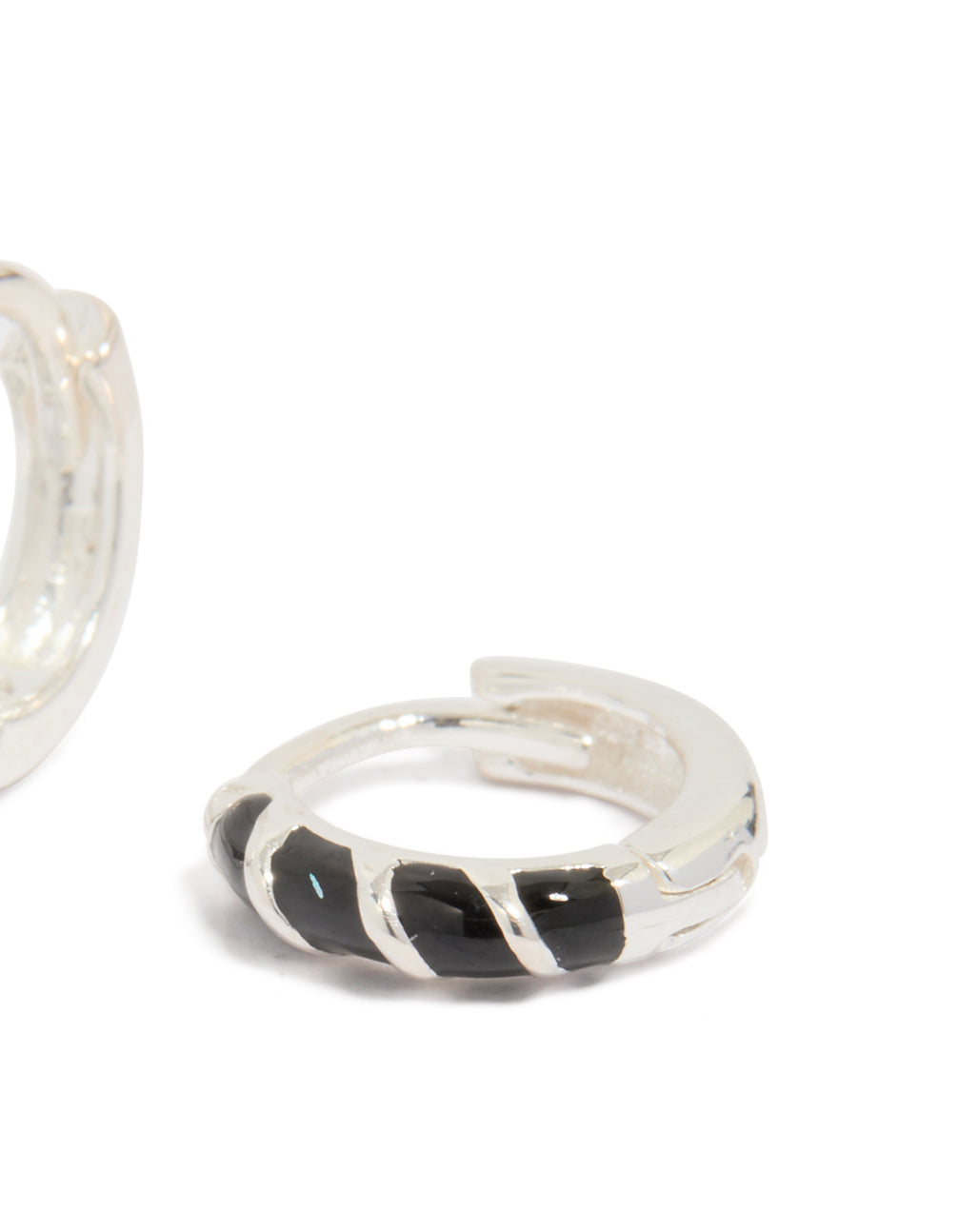 Designed with sterling silver and black striped enamel, these huggie earrings include hoop closure post detail view