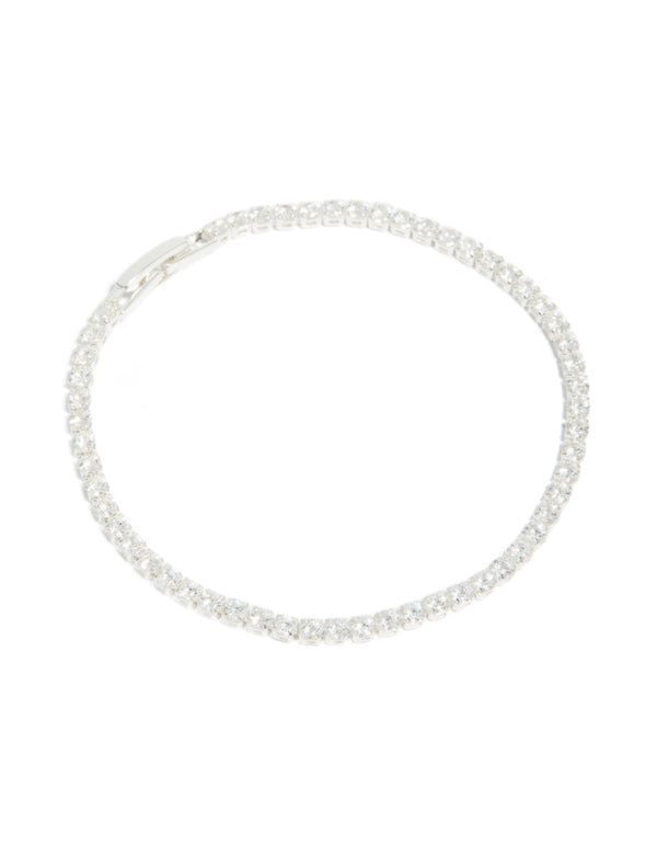 Showcasing a silver plated cubic zirconia small square tennis bracelet with glitter accents front view