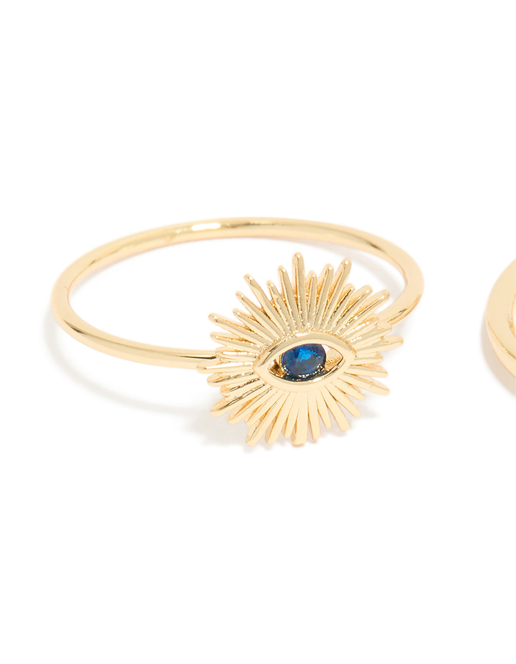 Designed with gold plated cubic zirconia evil eye and hamsa hand rings 4-pack featuring celestial sun motifs, crystal accents, and statement style side detail view