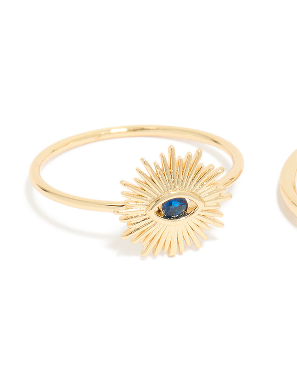 Designed with gold plated cubic zirconia evil eye and hamsa hand rings 4-pack featuring celestial sun motifs, crystal accents, and statement style side detail view