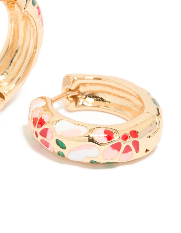 Close view of gold enamel floral thick earrings with chunky huggie closure in pink, red, and green pattern post detail view