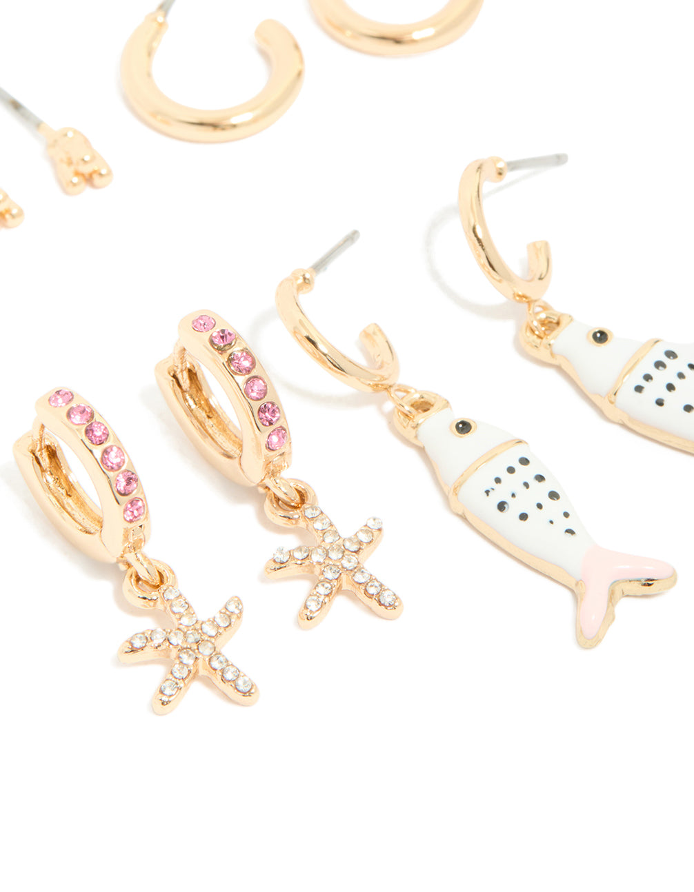 Crafted from gold pink and enamel, this fish earring 5-pack features animal ocean accents in white black, huggie stud hoop closures, close up view