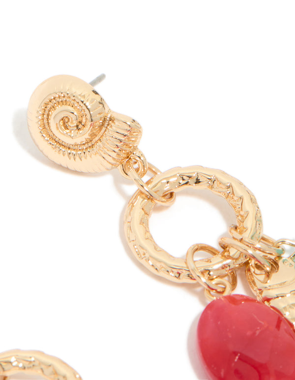 Highlighting gold red beaded and fish charm drop earrings with ocean accents in coral and turquoise post detail view