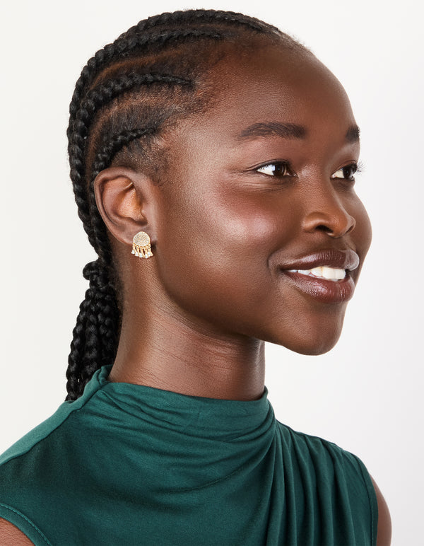 Designed with gold diamante jellyfish stud earrings featuring charm with ocean-inspired and white ivory accents on model view