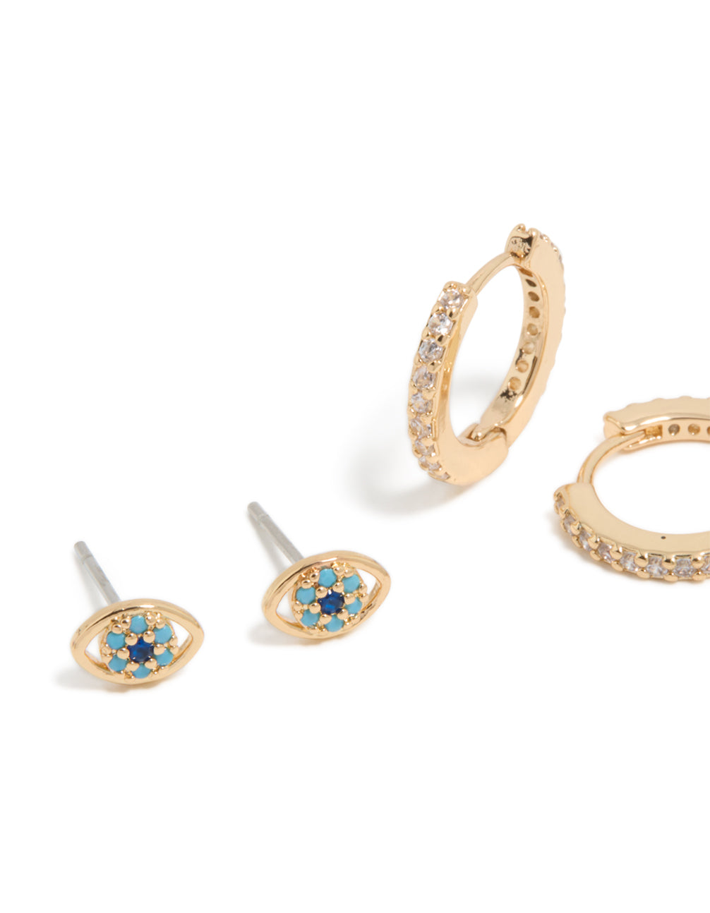 Featuring evil eye & cross cubic zirconia stud and huggie earrings in gold 3-pack close up view