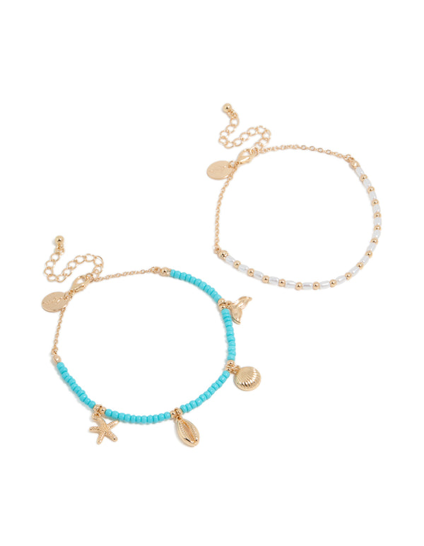 Discover turquoise and white beaded anklets featuring ocean-inspired shell charms with pearl accents in gold, 2-pack bracelets front view