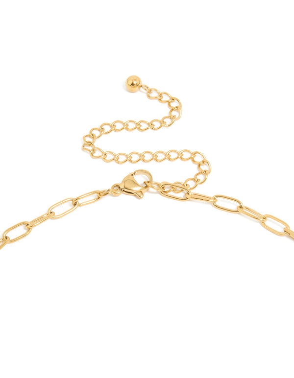 Highlighting the waterproof gold plated stainless steel oversized shell pendant necklace in ivory accent clasp detail view