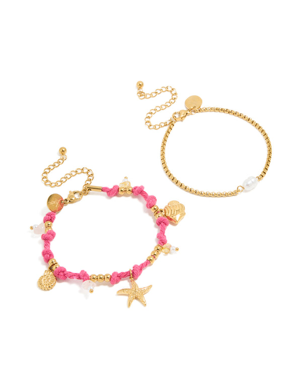 Showcasing waterproof gold plated stainless steel cord bracelets in a 2-pack featuring ocean charms with beads, rose quartz and freshwater pearl details in pink and white front view