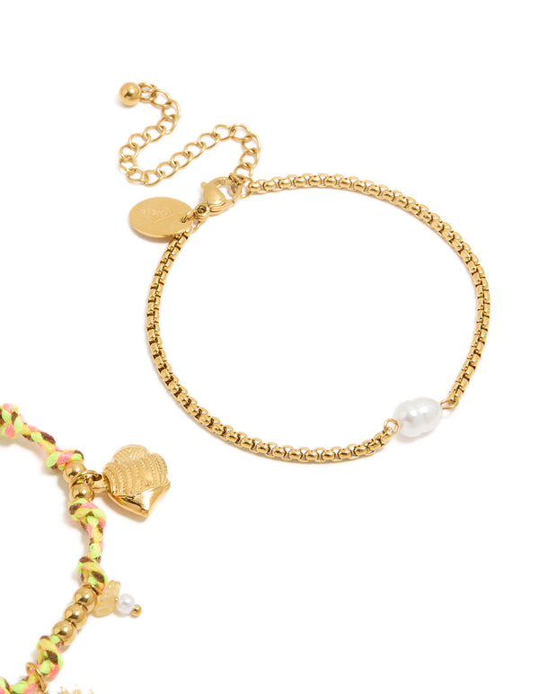 Designed with waterproof gold plated stainless steel freshwater pearl and multicoloured cord charm bracelets featuring celestial sun, shell, coin, rose quartz, and beads in a 2-pack closure detail view