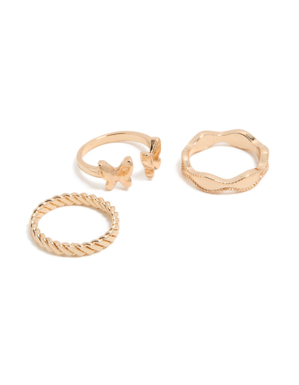 Featuring gold butterfly and twisted rings in a 3-pack front view