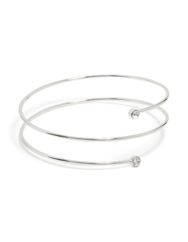 Crafted from silver, this diamante thin wrap arm cuff bangle features a coiled design front view