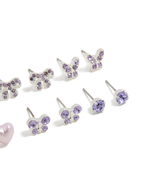 Showcasing kids diamante butterfly stud earrings 6-pack with heart, bow and star designs in silver plated finish close up view