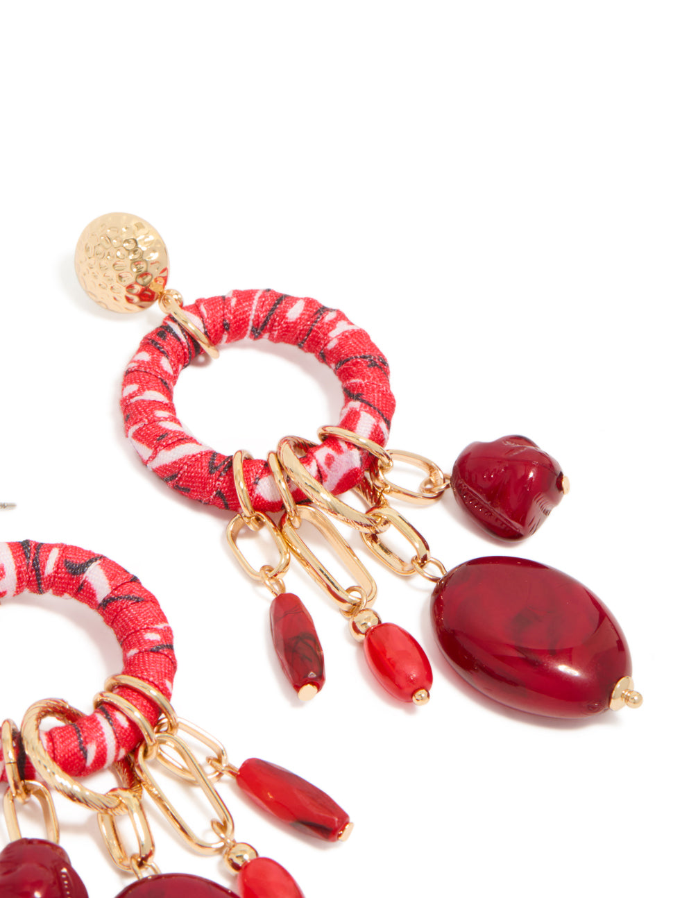 Detailed perspective of gold red beaded paper wrapped drop earrings featuring statement charm in maroon post detail view