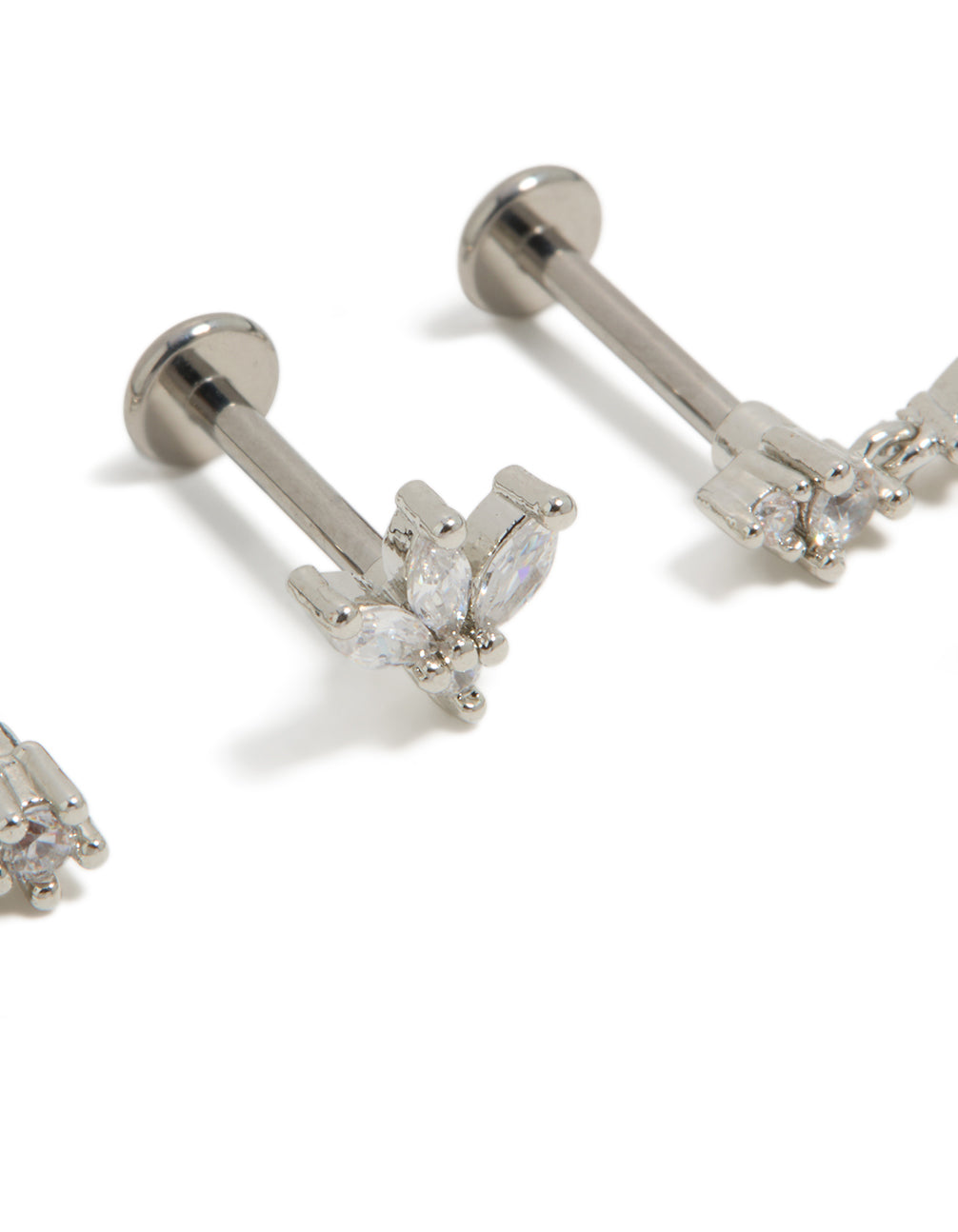 Showcasing titanium cubic zirconia flower drop flat back studs 3-pack in silver and clear close up view