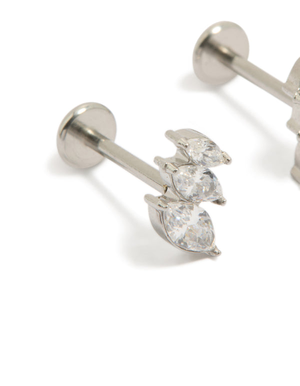 Displaying triple marquise flat back studs crafted from surgical steel with cubic zirconia in silver and clear close up view