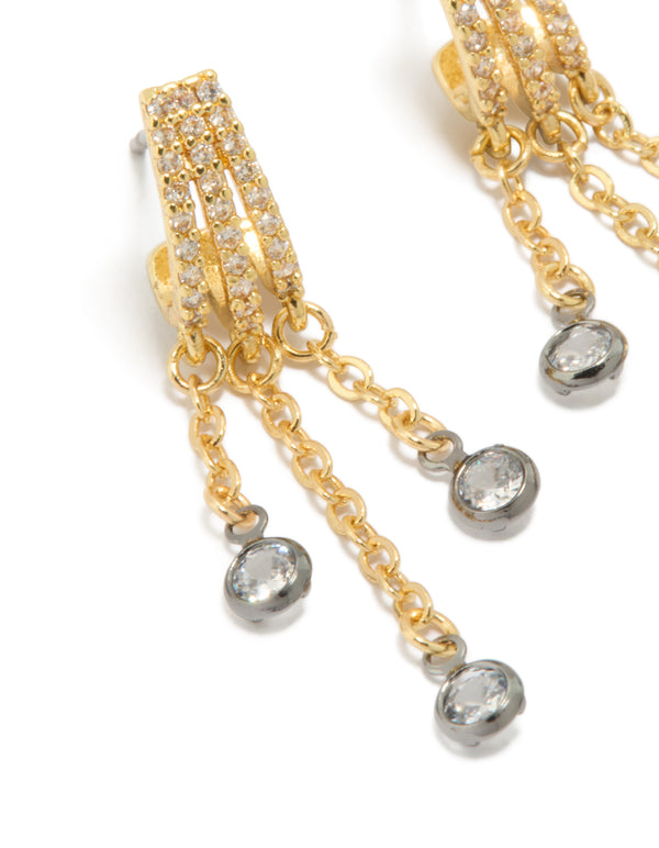 Intricately designed mixed metal plated cubic zirconia illusion hoop chain drop earrings with charm in statement style featuring gold, silver and clear stone close up view