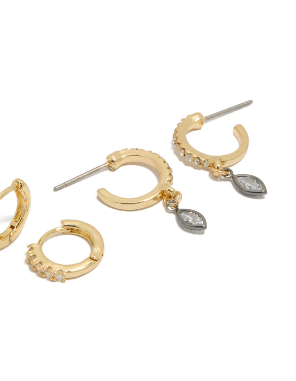 Mixed metal plated cubic zirconia bezel stud and huggie earrings in a 3-pack , gold, silver, and clear tones post detail view