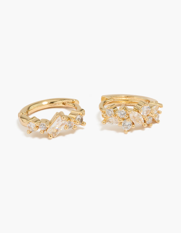 Presenting gold plated cluster cubic zirconia huggie earrings in a 2-pack with huggie closure close up view