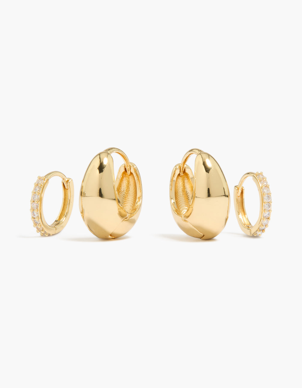 Showcasing gold plated cubic zirconia and oval huggie earrings 2-pack with clear stones in a front view