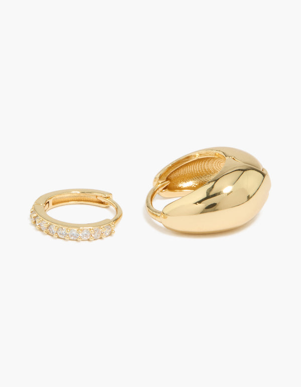 Designed with gold plated cubic zirconia and oval huggie earrings in a 2-pack close up view