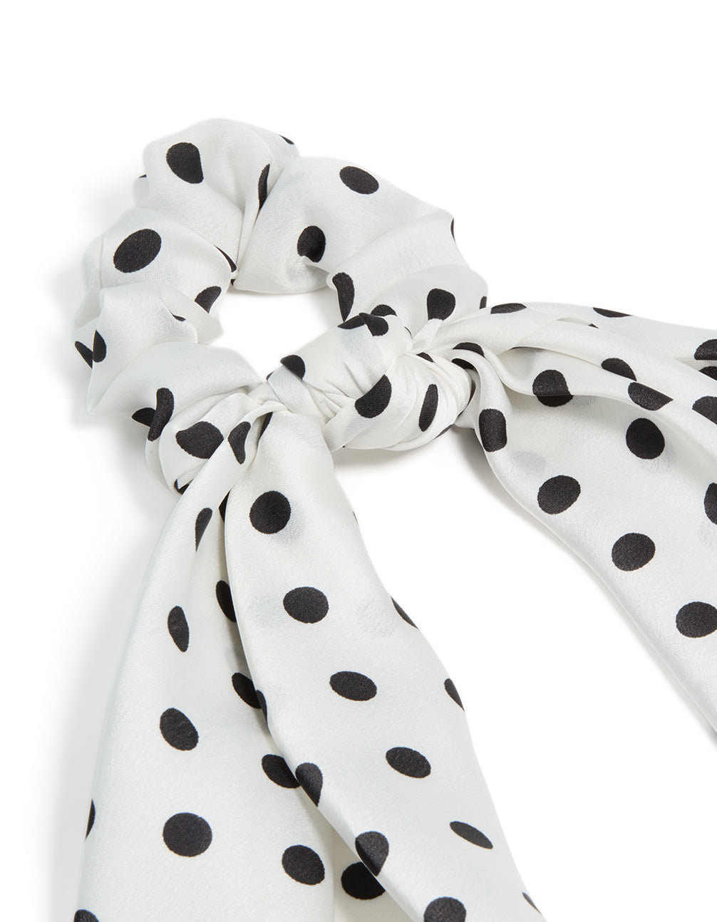 Featuring polyester with polka dot print in white and black scarf scrunchie side view