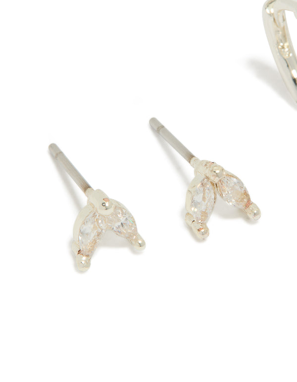 Featuring dainty leaf studs with baguette cut cubic zirconia in silver plated 2-pack close up view