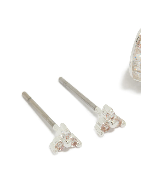 Designed with silver plated cubic zirconia trio stud and huggie earrings in a 2-pack close up view