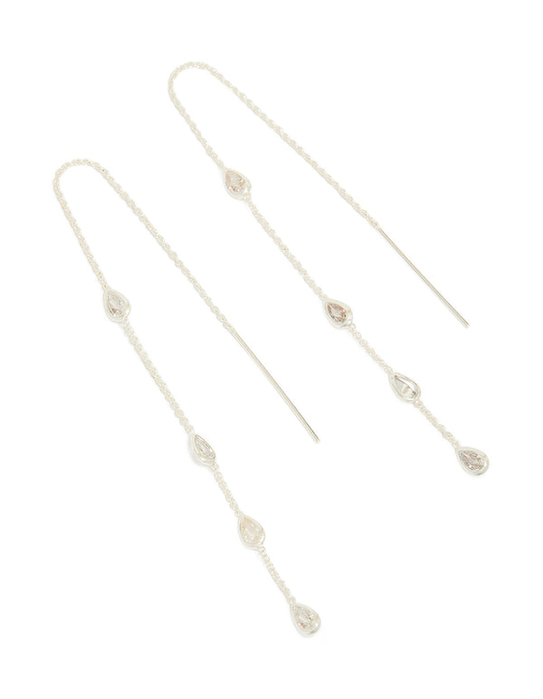 Showcasing station threader earrings with pear cut cubic zirconia set in silver plated metal front view