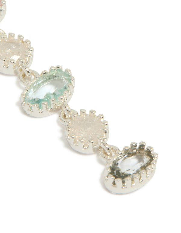 Designed with silver plated pink and blue cubic zirconia oval and round stone drop earrings in a close up view