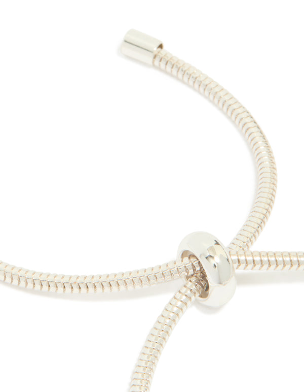 Silver plated diamante heart rondell charm bracelet with beads highlighting toggle closure detail view