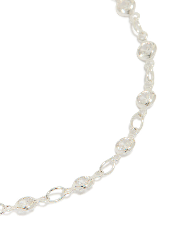 Designed with silver plated finish is this cubic zirconia round dainty chain bracelet close up view