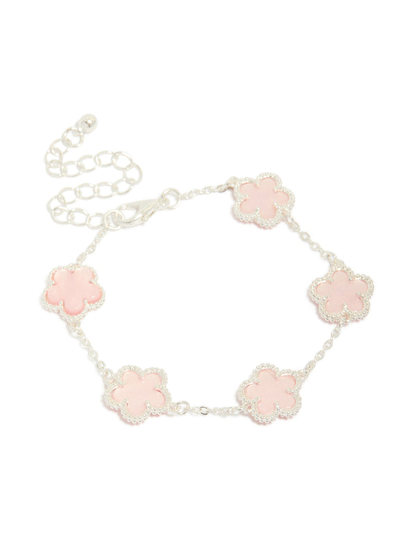 Showcasing a silver plated pink flower charms station bracelet with floral pattern in dainty style front view