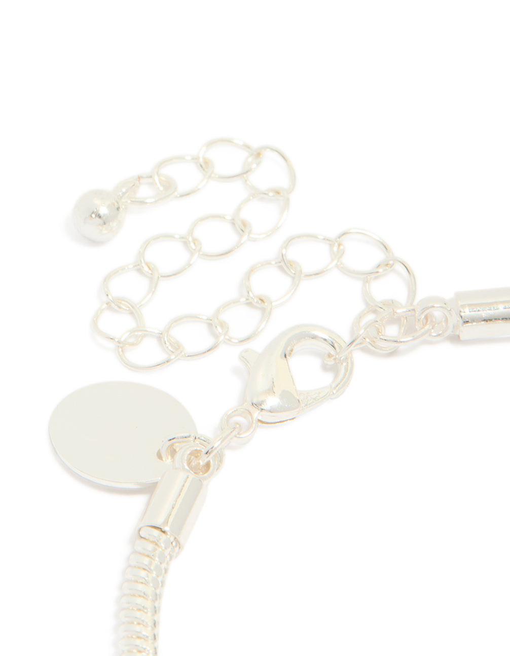 Highlighting the dainty silver plated bow charm bracelet with cubic zirconia and heart details on closure detail view