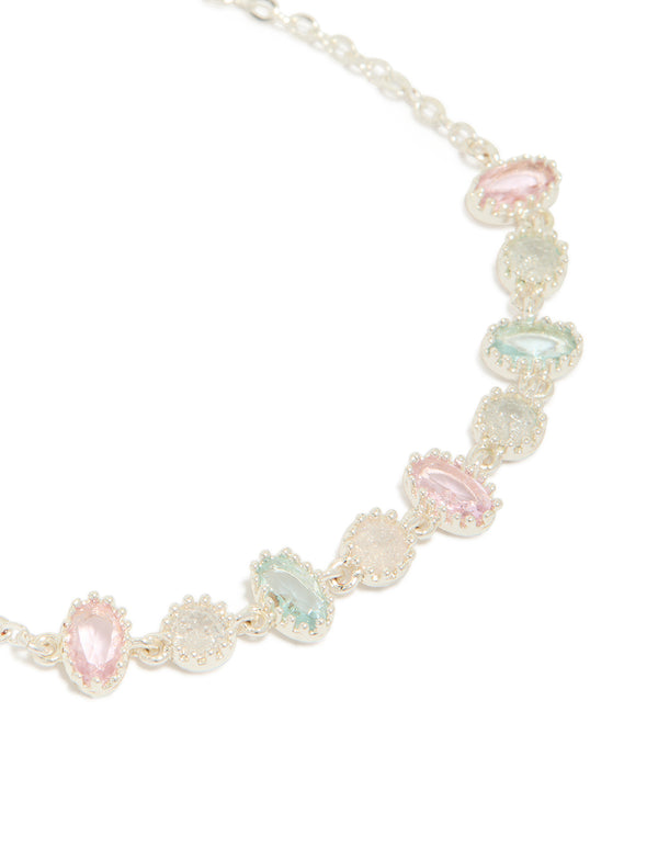 This silver plated oval and round cubic zirconia tennis toggle bracelet highlights close up view
