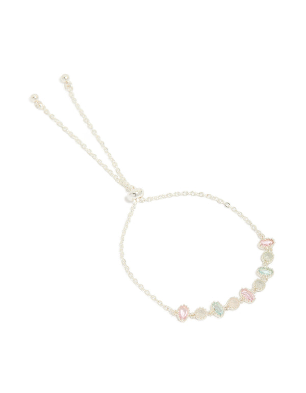 Featuring a silver plated oval and round cubic zirconia tennis toggle bracelet front view