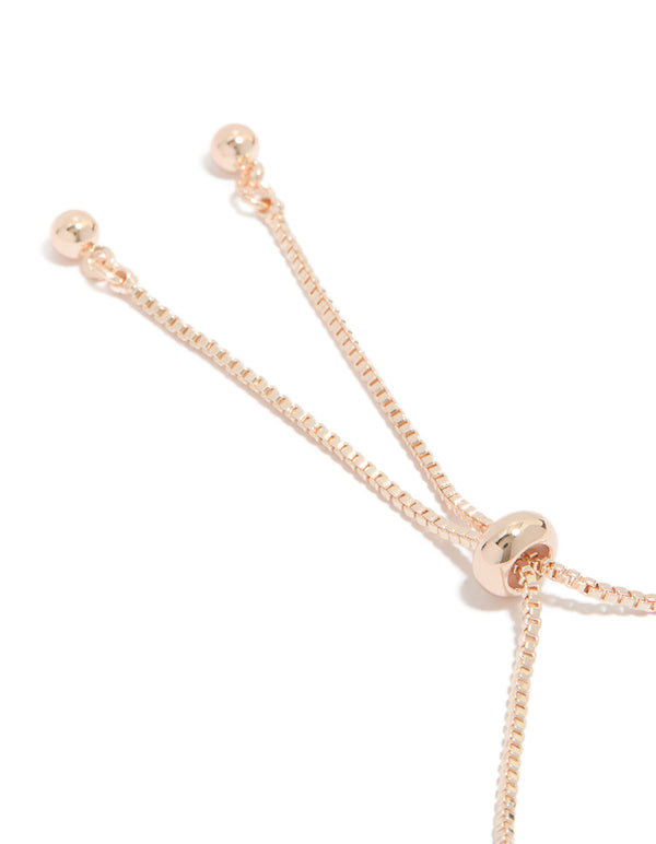 Showcasing floral rose gold plated cubic zirconia toggle bracelet closure detail view