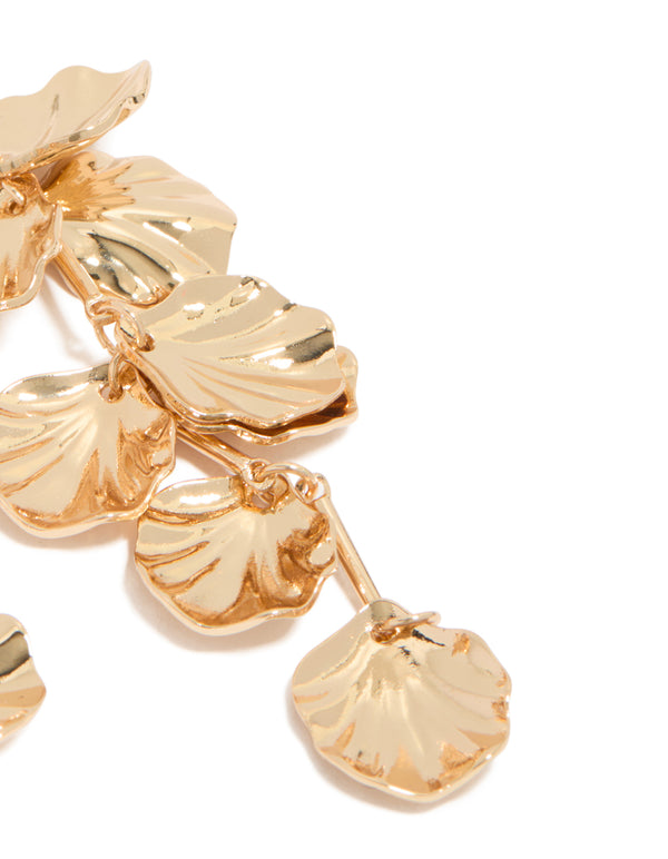 Crafted from gold with diamante and molten textured petal drop earrings featuring floral design in statement style detail view
