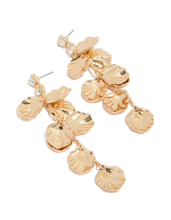 Showcasing gold diamante and molten textured petal drop earrings with floral design in statement style front view