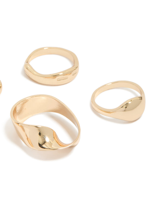 Featuring a gold organic dome ring pack with side detail view
