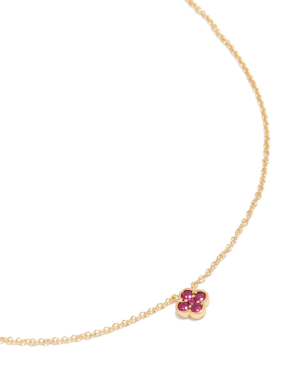 Beautifully crafted ruby July flower necklace featuring floral endant in gold plated dainty design close up view