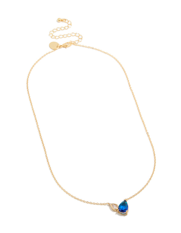 Featuring a gold plated September blue cubic zirconia pendant necklace crystal and dainty design front view