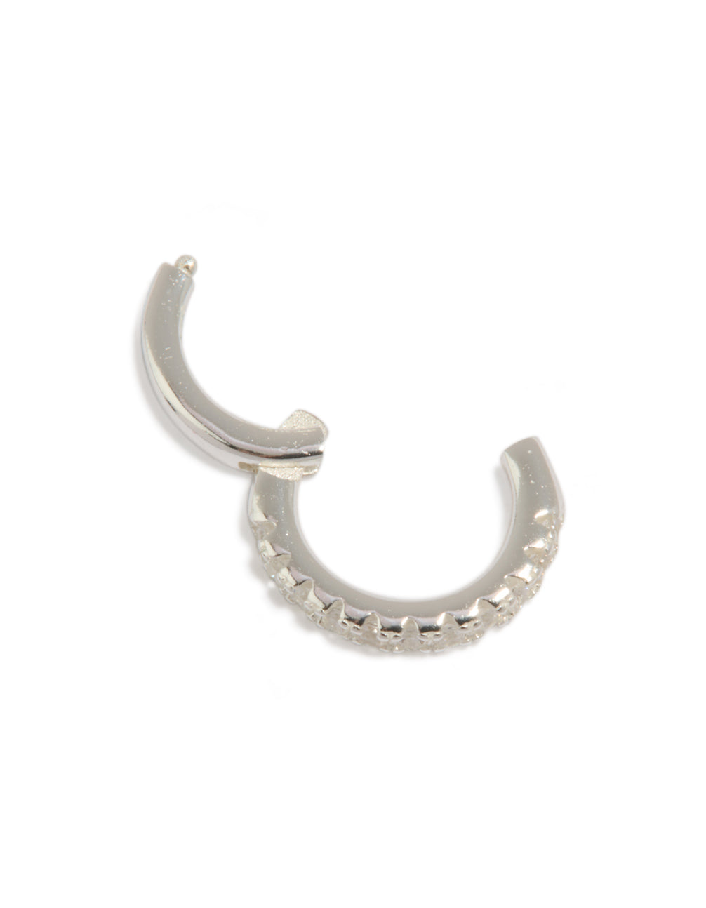 Showcases a sterling silver cubic zirconia clicker ring with huggie closure in chunky style detail view