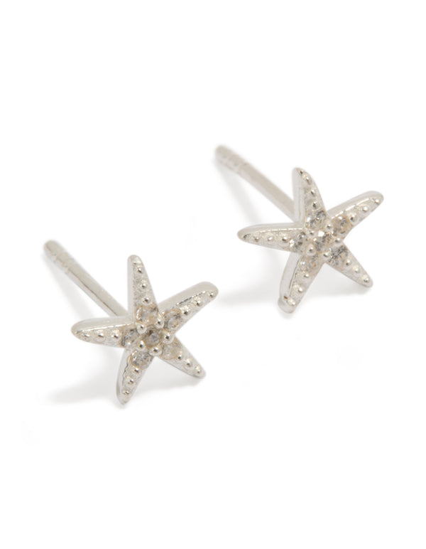 Discover dainty sterling silver cubic zirconia starfish earrings with ocean-inspired design front view