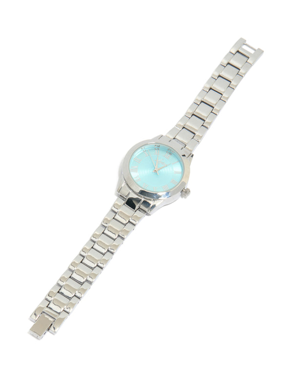 Showcasing a women's watch with roman numeral blue dial, round shape, casual analog design, link band strap in silver front view