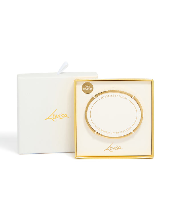 Featuring waterproof gold plated stainless steel with cubic zirconia roman numeral hinged bangle closure detail view