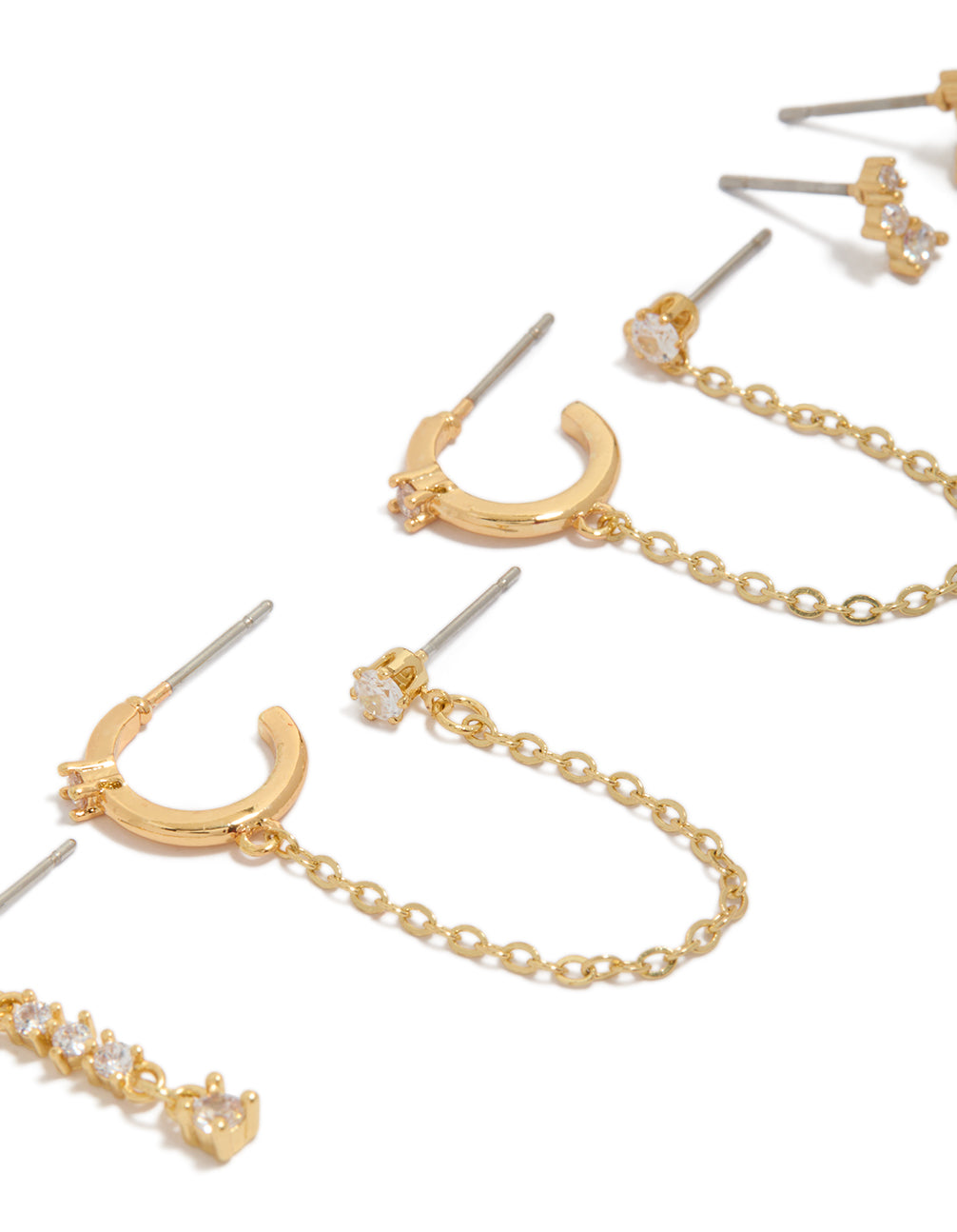 Featuring gold plated cubic zirconia chain drop and stud earrings in a 4-pack featuring crawler design and hoop closure in close up view