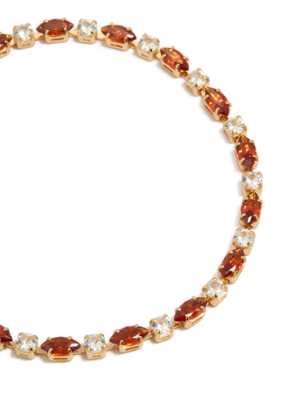 Designed with gold plated clear and cognac cubic zirconia multi cut tennis bracelet close up view